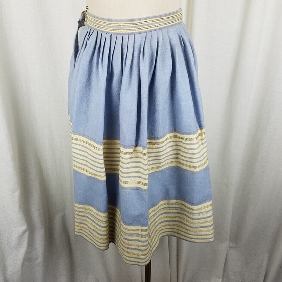 A woman in a black top and plaid skirt posing for a picture - AI